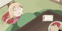 a cartoon girl is sleeping on a blanket next to a plate of food