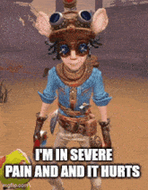 a cartoon character with a hat and goggles says " i 'm in severe pain and it hurts "