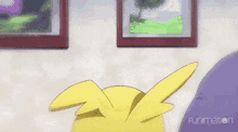 a cartoon character is wearing a red and yellow outfit and a yellow hoodie .