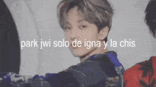 a close up of a person 's face with the words `` park jwi solo de igna y la chis '' written on it