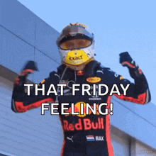 a man wearing a red bull outfit flexes his muscles