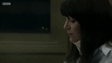 a blurry picture of a woman with the bbc logo on the bottom right