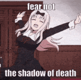a girl in a black dress is dancing with the words fear not the shadow of death below her