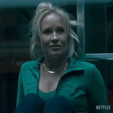 a woman in a green jacket says jesus christ on netflix