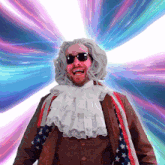 a man wearing a wig and sunglasses stands in front of an american flag