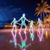 a group of glowing skeletons are dancing on a beach at night