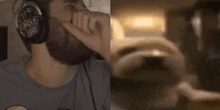 a man wearing headphones is playing a video game .