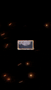 a picture of a woman 's face is surrounded by a fire frame .