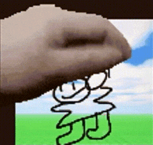 a pixelated image of a hand drawing a cartoon character on a screen .