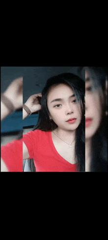 a woman in a red shirt is taking a selfie with a wel sign behind her