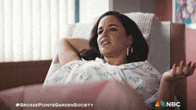 a pregnant woman is laying in a hospital bed with the nbc logo in the corner