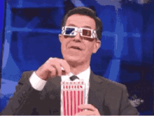 Popcorn Stephen Colbert GIF - Popcorn Stephen Colbert Eat GIFs