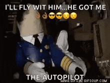 a pilot with a paper bag on his head is sitting in the cockpit of a plane .