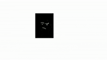 a black square with a sad face drawn on it