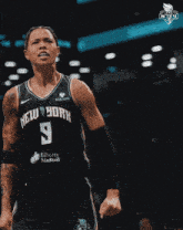 a basketball player wearing a new york jersey with the number 9 on it