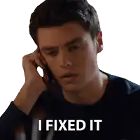 a man talking on a cell phone with the words " i fixed it " on the bottom