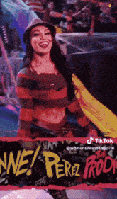 a woman in a freddy krueger costume is standing in front of a sign that says " ne perez rock "