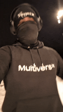 a person wearing a hoodie that says multversx on it