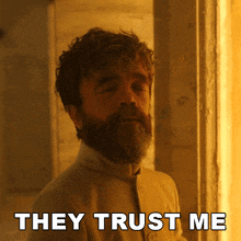 a man with a beard and the words " they trust me " on the bottom