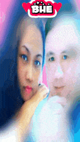 a man and a woman are posing for a picture with bhe written on the top