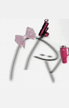 a headband with a pink bow and a cell phone on it .