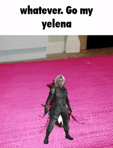 a woman is standing on a pink carpet with the words " whatever go my yelena "