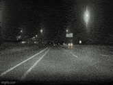 a black and white photo of a highway with a sign that says imgflip.com in the corner