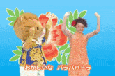 a hello kitty mascot is standing next to a woman in a dress