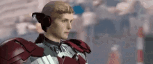 a computer generated image of a man wearing headphones and armor