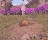 a person standing in a field of purple flowers with a statue in the foreground