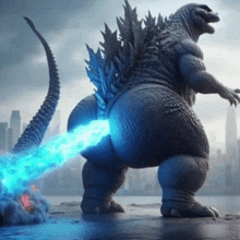 a godzilla is standing on a city street with a blue flame coming out of his butt .