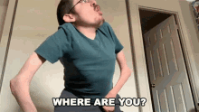 a man with glasses and a green shirt says where are you
