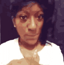 a drawing of a woman 's face with a white shirt on