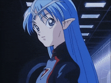 a blue haired anime character with a s on her chest