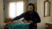 Doing Laundry Messy House GIF - Doing Laundry Messy House Tidying Up GIFs