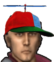 a man wearing a red blue and green hat with a worm on top of it