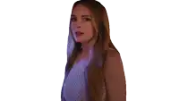 a woman with long red hair is wearing a white tank top