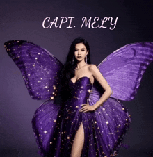 a woman in a purple dress with butterfly wings and the name capi melly