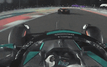 a steering wheel of a race car that says crowdstrike on it