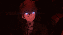 a close up of a person 's face with glowing blue eyes