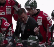 a hockey player wearing a helmet with the number 59