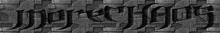 a black and white photo of a brick wall with the word more written in black letters .