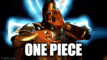 a man in a knight 's armor is making a hand gesture with the word one piece written on the bottom .