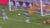 a soccer game is underway with a continental advertisement in the background