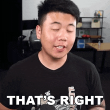 a man wearing a black shirt that says that 's right on it