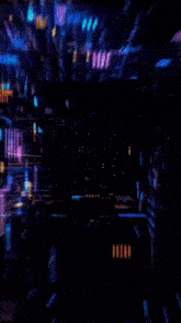a blurred image of a city at night with a lot of lights