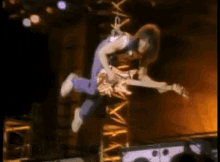 Eddie Van Halen Guitarist GIF - Eddie Van Halen Guitarist Hanging GIFs