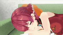 a red haired anime girl laying on a green couch