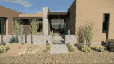 an artist 's impression of a house with a brick walkway leading to the entrance
