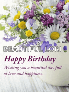 a birthday card with flowers and the words beautiful lori